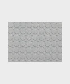 Tło z szarym wzorem w kropki, idealne do zastosowań w obszarze bezpieczeństwa pracy i ochrony środowiska. Struktura zapewnia odpowiednią przyczepność, co jest ważne w kontekście środki awaryjne.